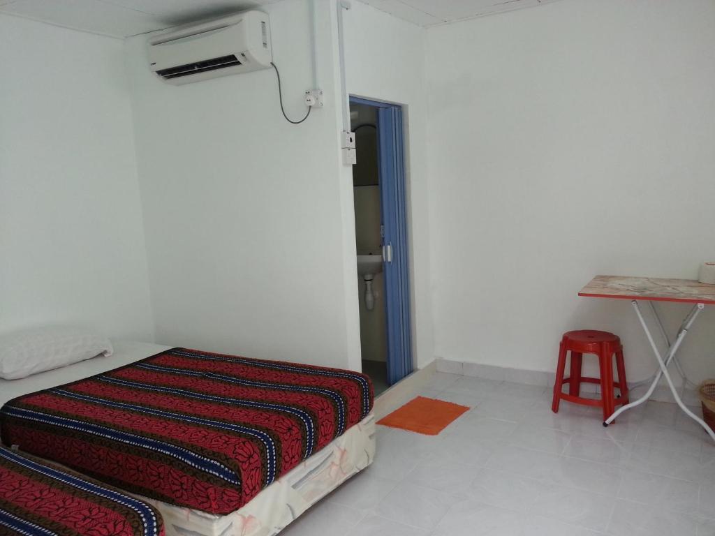 Et Budget Guest House Batu Ferringhi Quarto foto