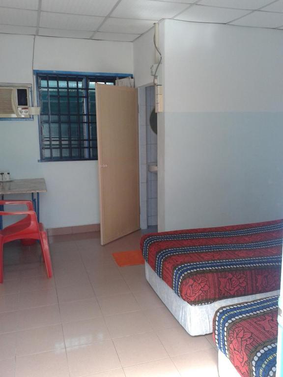 Et Budget Guest House Batu Ferringhi Quarto foto